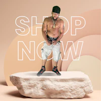 a man standing on top of a rock with the words shop now