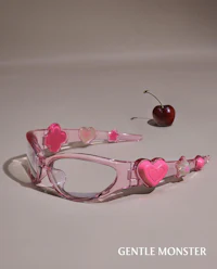 a pair of glasses with cherries and hearts on them