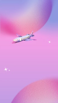 a pink and purple airplane in the sky