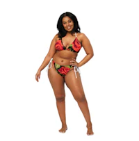 a woman in a black bikini posing for a photo