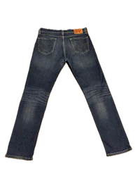 a pair of jeans on a black background