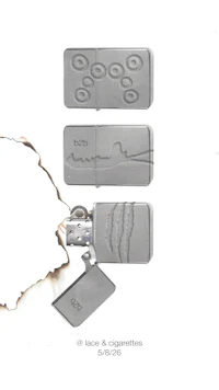 a zippo lighter with three different designs on it