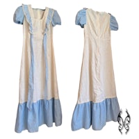 a white and blue dress with ruffles