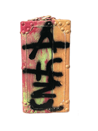 a box with graffiti on it is on a black background