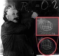 a picture of albert einstein writing on a chalkboard