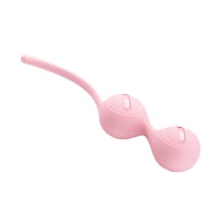 a pink sex toy on a white background