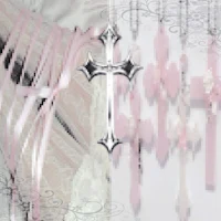 a picture of a cross with pink ribbons and lace
