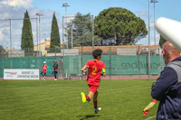 a group of people playing a game of soccer