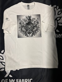 a white t - shirt with an image on it