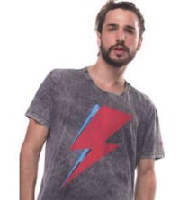 a man wearing a t - shirt with a lightning bolt on it