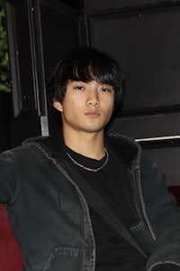 a man wearing a black jacket