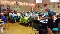 a group of people eating at a table