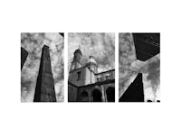 a black and white photograph of a clock tower