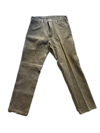 a pair of grey jeans on a black background