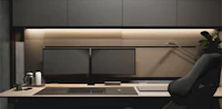 a computer desk with black cabinets and a black chair