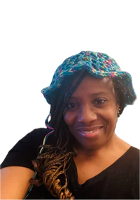 a woman wearing a colorful crocheted hat