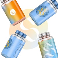 four jars of supplements with the letter s on them
