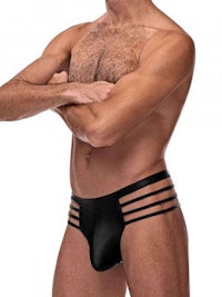 a man wearing a black thong underwear