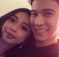 a man and a woman posing for a photo
