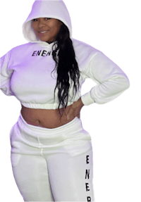 a woman wearing a white hoodie and sweatpants