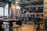 a restaurant with tables and chairs