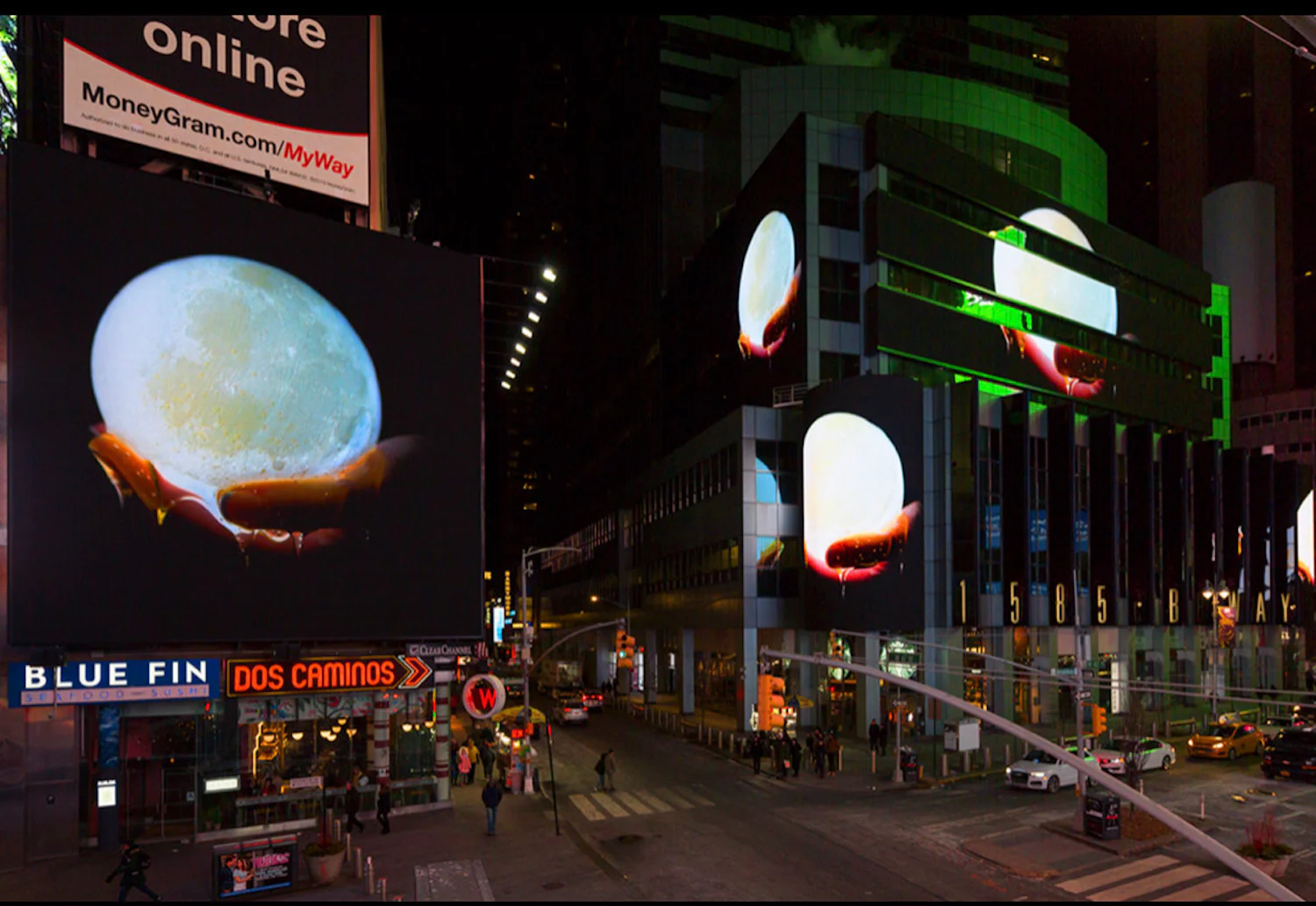 a large billboard with a moon on it