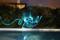 a light painting on a pool