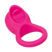 a pink plastic ring with a ring on it