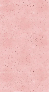 a pink background with dots on it