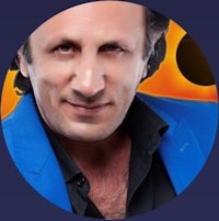 a man in a purple suit with stars in the background