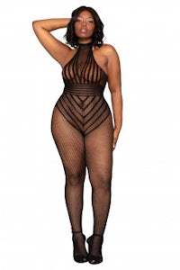 a black woman in a fishnet bodysuit