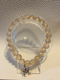a bracelet with a bead on it