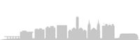 a silhouette of a city skyline on a black background