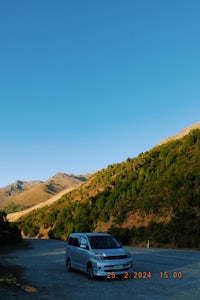 a car parked on a gravel road