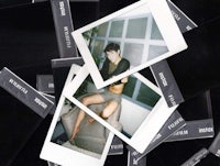 a group of polaroid photos stacked on top of each other