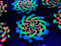 a group of colorful glow in the dark toys in a dark room