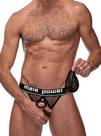 a man wearing a thong with the word melia power on it