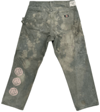 a pair of jeans with a patch on them