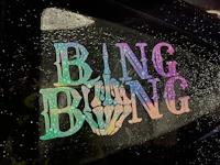 a car with the word bing bing on it