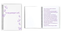 a purple spiral notebook with a poem on it
