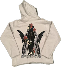 a hoodie with a cross and angels on it