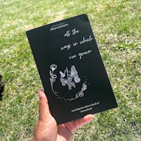 a person holding up a book that says all the angels are angels
