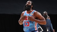 a basketball player with a beard on his face