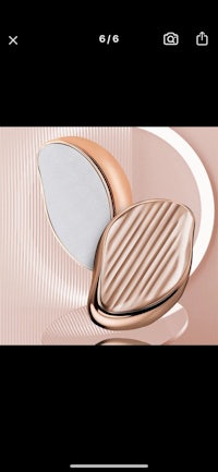 a photo of a compact powder on a white background