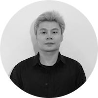 a black and white photo of a man in a black shirt