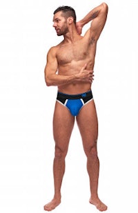 a man is posing in a blue and black brief