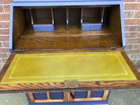 a blue desk with a yellow top