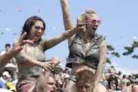a woman with mud on her face