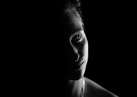 a black and white photo of a woman's face