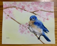 a watercolor painting of a blue bird perched on a cherry blossom branch